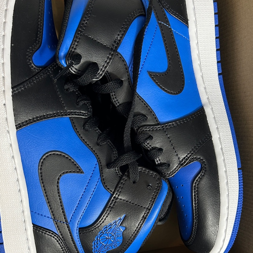 Air Jordan 1 Mid Black and Blue High-Top Sneakers